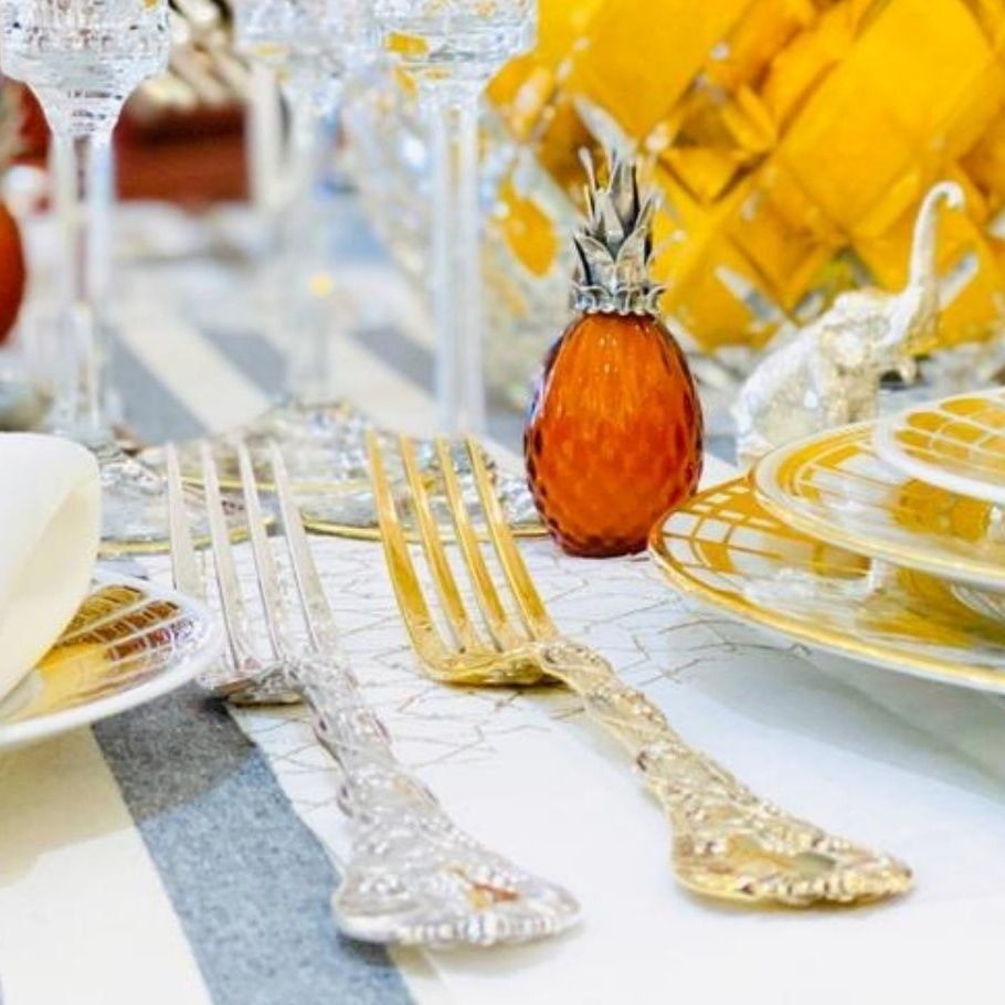 Pineapple basket, napkin holder, and serving buy caddy set.